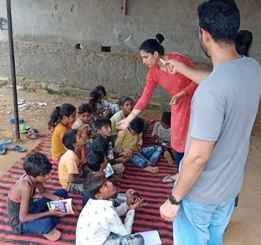 Neha Sharma teaching children